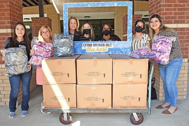 Costco donates backpacks to Jowell Elementary School.
